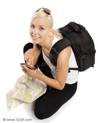 blond-girl-tourist-with-map-sitting-down